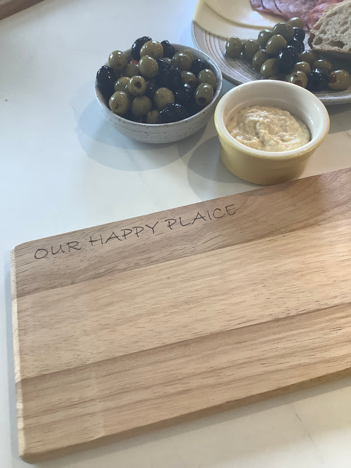 Hand-decorated Acacia wood serving board with Happy Plaice design