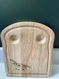 Hand-decorated with pyrography, this Hevea wood egg board with Connie Bunny design, handcrafted for  the perfect gift for kids, or grown ups!
