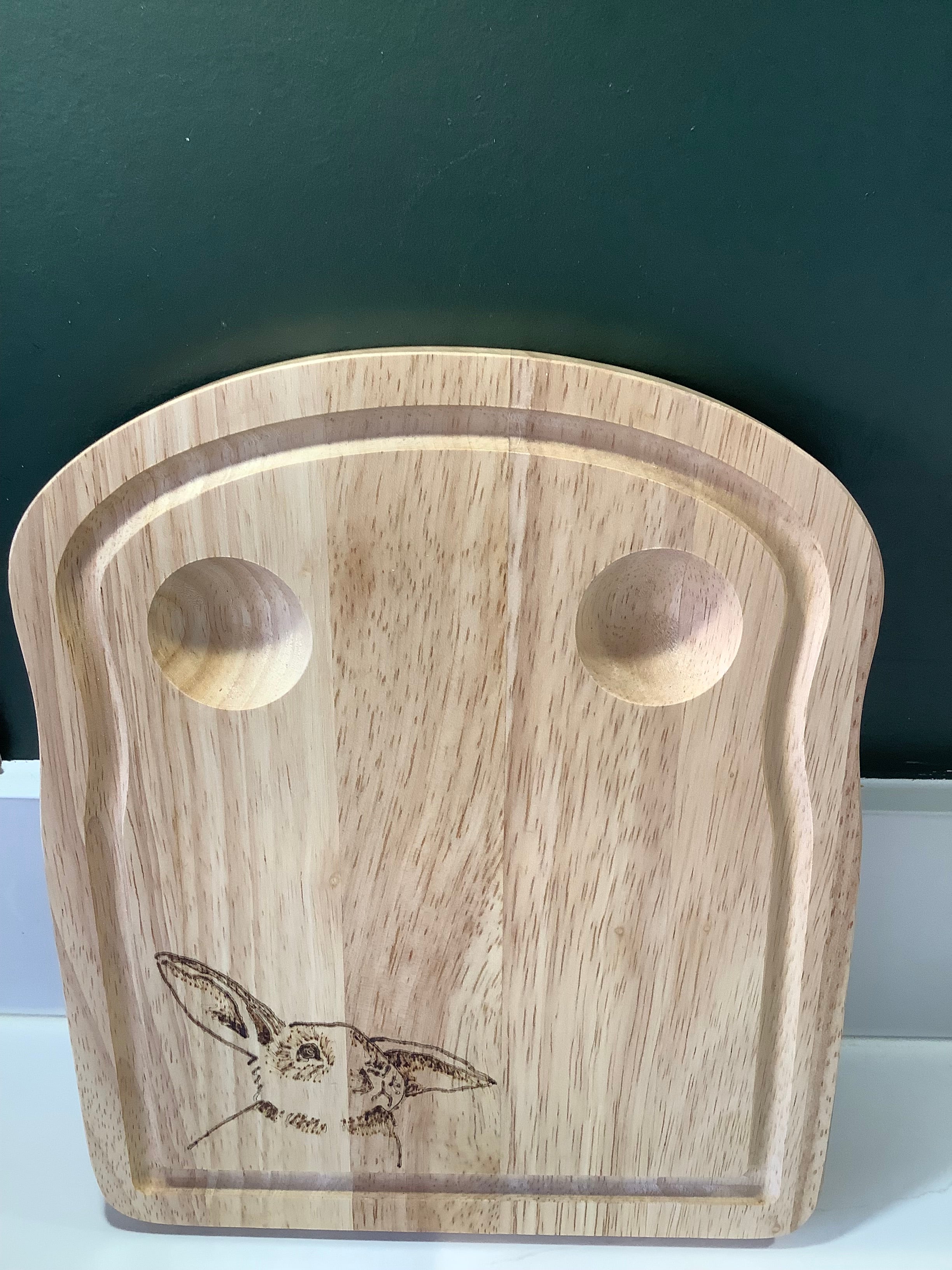 Hand-decorated with pyrography, this Hevea wood egg board with Connie Bunny design, handcrafted for  the perfect gift for kids, or grown ups!