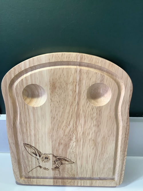Hand-decorated with pyrography, this Hevea wood egg board with Connie Bunny design, handcrafted for  the perfect gift for kids, or grown ups!