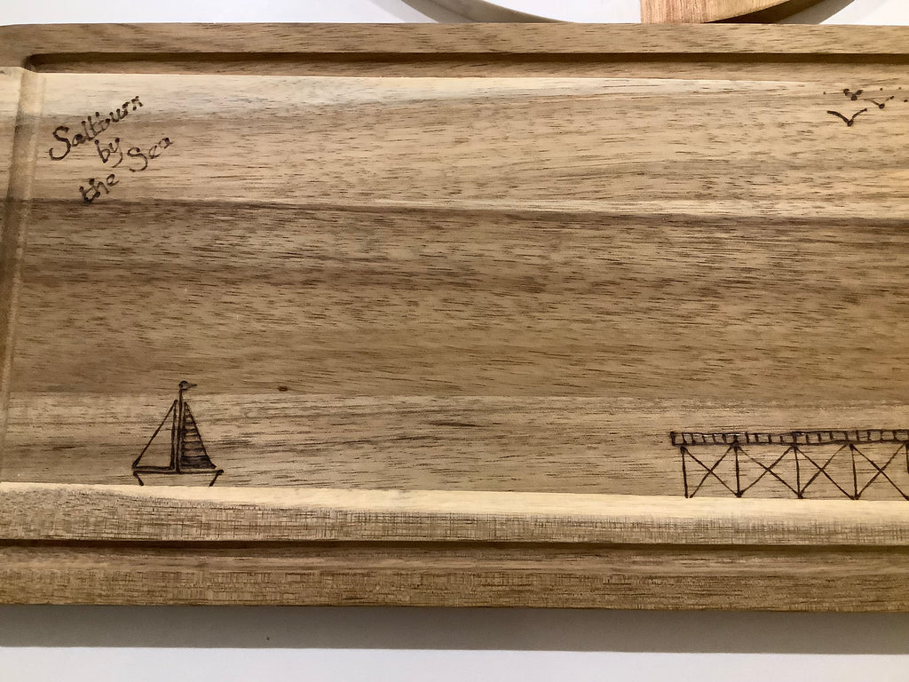 Cartoon illustration of Saltburn Pier and yacht, coastal art  gift. Acacia wood with hand drawn  image  with pyrography