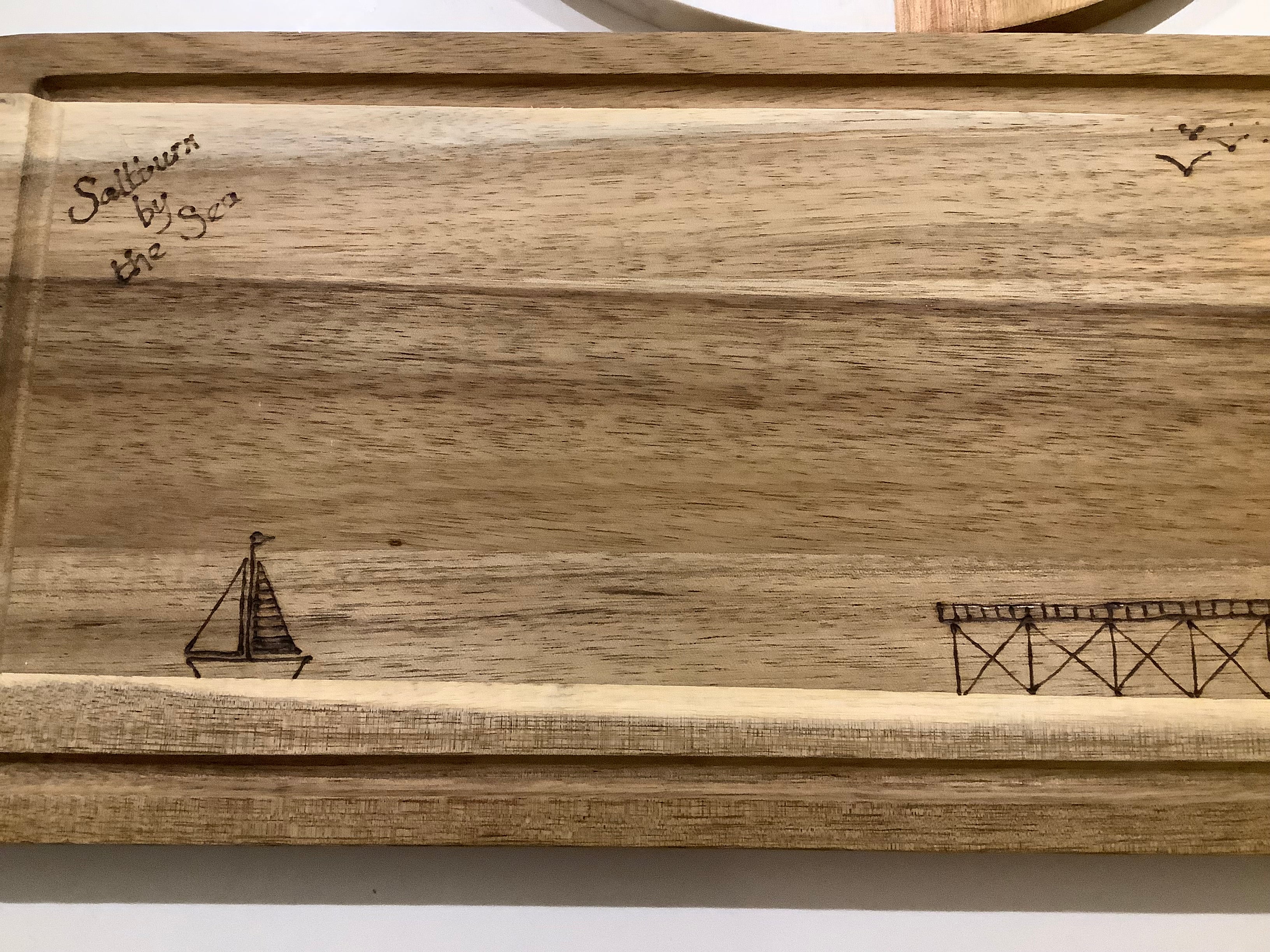 Cartoon illustration of Saltburn Pier and yacht, coastal art  gift. Acacia wood with hand drawn  image  with pyrography