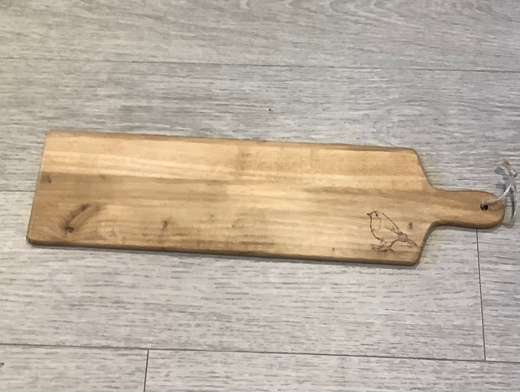 Hand-decorated using pyrography, this long wooden serving board with a robin design, handcrafted coastal gift